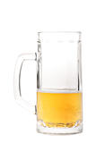 Half-drank beer mug isolated on white