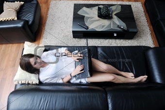 girl working on laptop at home