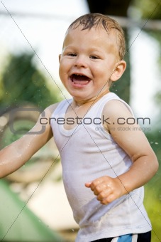 toddler and water splash