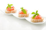 Bruschetta with tomatoes and basil isolated