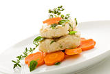 Cod over carrots isolated