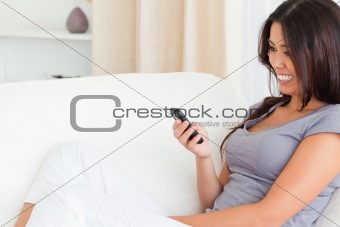 cute woman looking at mobile