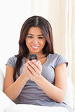 amazed woman looking at mobile phone