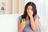 sad woman with orange juice
