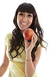 Happy female eating healthy apple