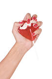 Heart shape lollipop in a hand