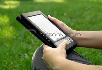 Young Woman Reading on eBook