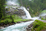 Alps waterfall summer view
