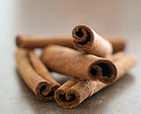 cinnamon sticks in a pile closeup