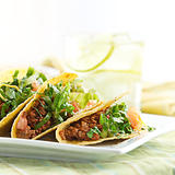 a platter of three tacos