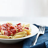 penne pasta in tomato sauce with copyspace