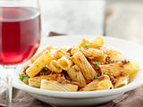 rigatoni pasta with tomato meat sauce and wine