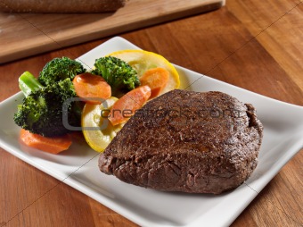 seared steak with vegetables