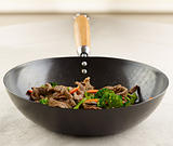 view of stir fry in a wok