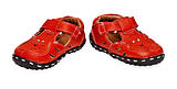 Red children's leather shoes on white