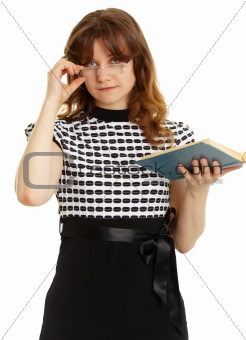 Young beautiful woman in glasses with a book