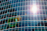 Abstract view - skyscraper windows and solar flare