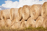 Stack of hay bales drying outdoors
