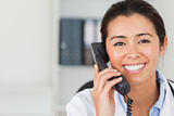 Gorgeous female doctor on the phone and posing