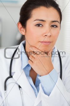 Beautiful female doctor with a stethoscope posing