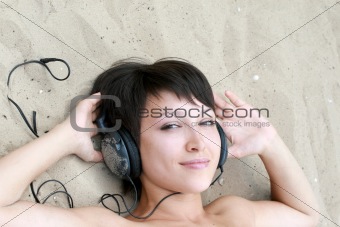 Young girl with ear-phones