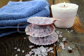 Spa still life .Bath lilac salt, towel and  candle