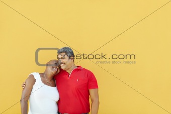 happy 50 years old man embracing woman