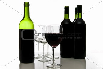 bottles of red wine and wineglasses