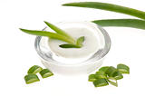 aloe vera - leaves and cream isolated on white background 