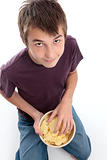 Boy eating potato chips