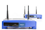 two blue internet router with two antennas
