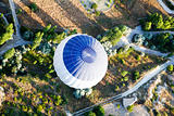 shot from above blue and white hot air balloon