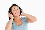 Lovely woman using her headphones
