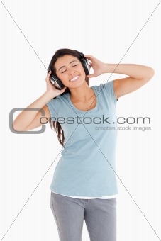 Gorgeous woman using her headphones