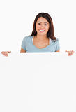 Attractive woman holding a  board