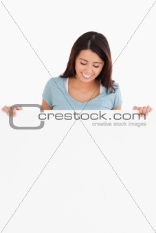 Gorgeous woman holding a  board