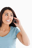 Portrait of an attractive woman on the phone posing