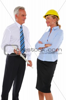 man with plan and woman architect with hard hat
