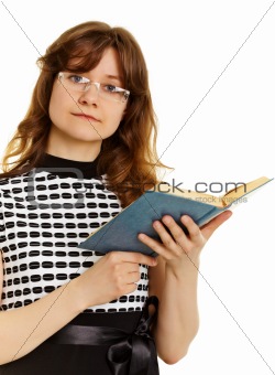 Young woman in glasses with  textbook