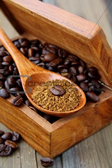 flavored coffee beans in a wooden brown box