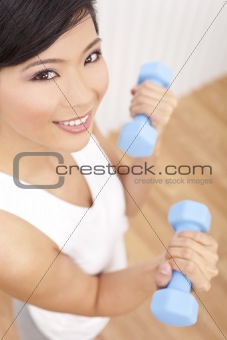 Beautiful Young Asian Chinese Woman Lifting Weights At Gym