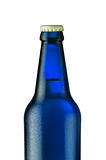 Full blue bottle of beer with drops on white