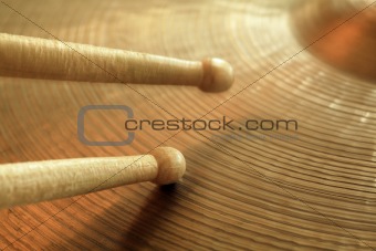 Cymbal and drumsticks