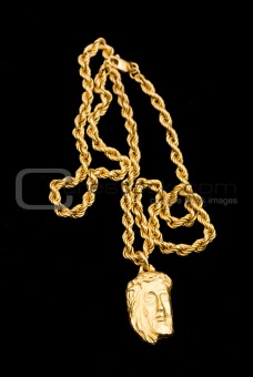 Gold chain on black
