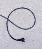 black electrical cable with plug