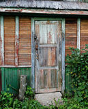 Old door of ramshackle house.