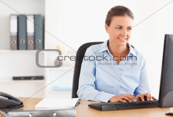 Office worker typing on a keyboard