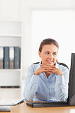 Office worker looking at her computer