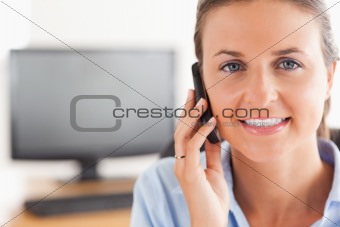 Close up of a businesswoman making a phone call