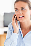 Portrait of a working woman speaking on the phone